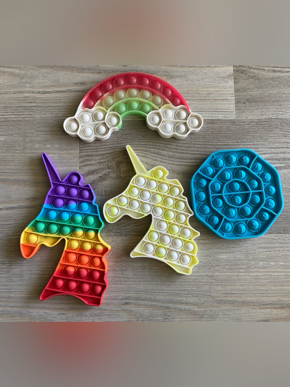 Lot of 4 Silicone Pop It Fidget Toys - Unicorns, Rainbow & Alphabet